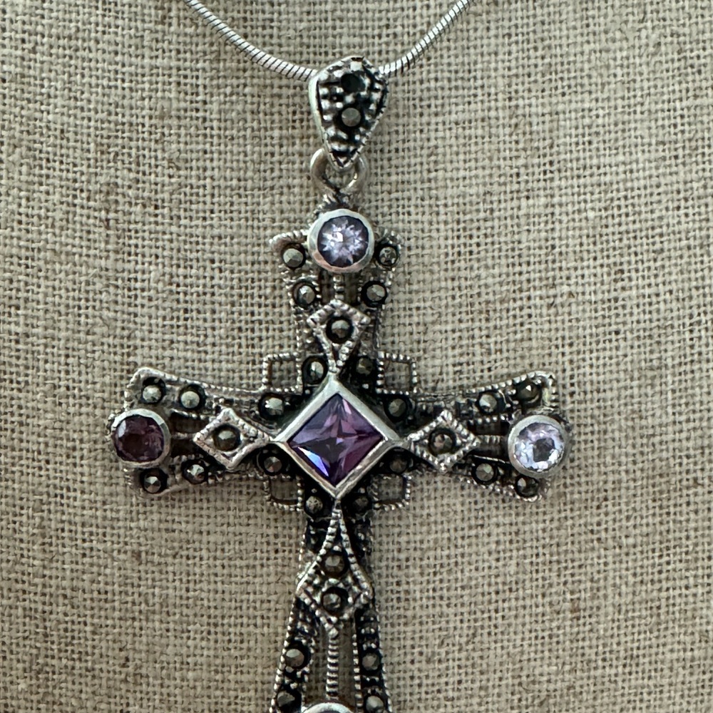 Large sterling silver amethysts stone cross pendant.